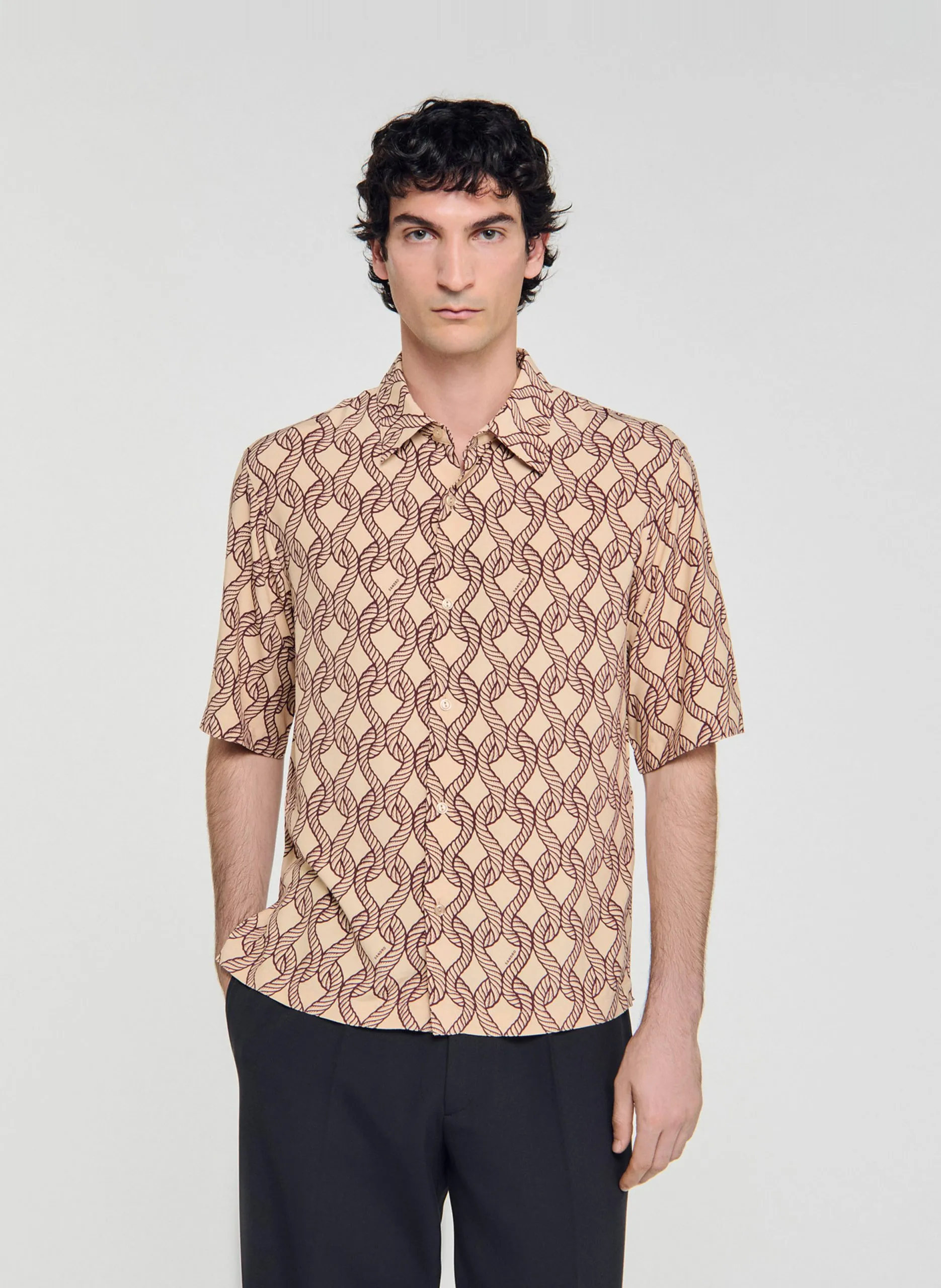 Ärmellose Bluse mit klassischem Kragen und Print Beige